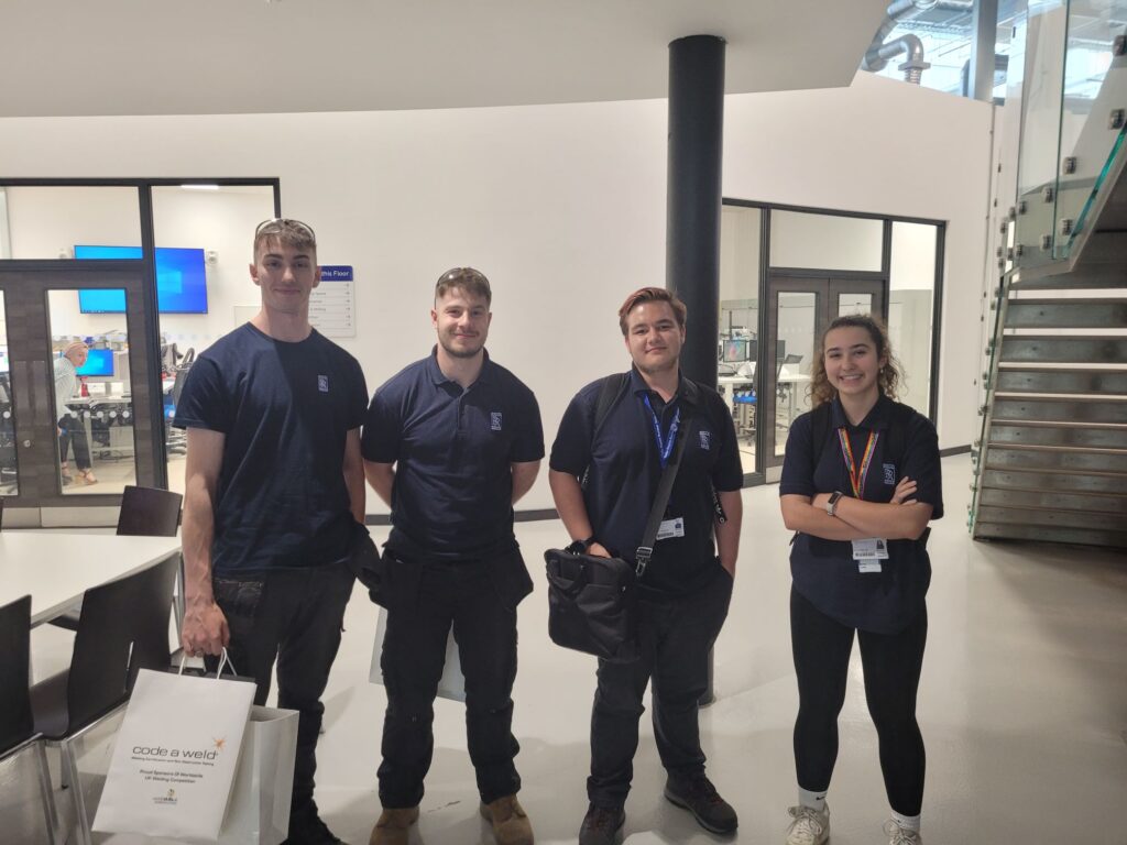 Oliver Ballington and James Cantrill (winners) and Katie Jubb and Luke Mason (apprentices) stood together at the Rolls-Royce Nuclear Skills Academy